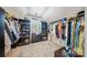 Organized walk-in closet with shelving, hanging rods and natural light at 137 Branchview Dr, Mooresville, NC 28115