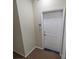 Hallway view of a white door marked 303 at 1410 4Th Street Nw Dr # 303, Hickory, NC 28601