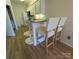 Open-concept kitchen with a breakfast bar and seating, creating a welcoming and functional space at 1410 4Th Street Nw Dr # 303, Hickory, NC 28601