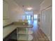 Stylish kitchen with an island counter and a view into the main living area at 1410 4Th Street Nw Dr # 303, Hickory, NC 28601