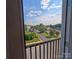 Outdoor view from balcony showing parking lot and green landscape at 1410 4Th Street Nw Dr # 303, Hickory, NC 28601