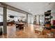 Large basement space with light-colored wood flooring and office area at 14411 Eastfield Rd, Huntersville, NC 28078