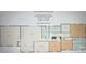 Detailed floor plan showcasing layout with bedrooms, kitchen, living spaces, and garage at 14411 Eastfield Rd, Huntersville, NC 28078