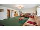 Open living room with a view into the kitchen, comfortable seating, and a cozy feel at 14411 Eastfield Rd, Huntersville, NC 28078