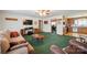 Inviting living room with comfortable furniture and seamless flow into kitchen area at 14411 Eastfield Rd, Huntersville, NC 28078