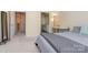 Cozy bedroom with neutral carpet, convenient ensuite bathroom, and two door access at 14624 Via Sorrento Dr # 6206, Charlotte, NC 28277