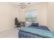 Well-lit bedroom with a ceiling light fixture, window views, neutral paint, and carpeted floors at 14624 Via Sorrento Dr # 6206, Charlotte, NC 28277