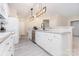 Well-equipped kitchen with modern appliances, bright lighting, and stylish countertops for a functional space at 14624 Via Sorrento Dr # 6206, Charlotte, NC 28277