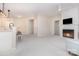 Inviting living room with fireplace and open layout to kitchen area at 14624 Via Sorrento Dr # 6206, Charlotte, NC 28277