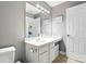 Bathroom features a modern sink, a large mirror, and updated fixtures at 15508 Normans Landing Dr, Charlotte, NC 28273