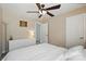 Bright bedroom with white walls, ceiling fan, and spacious layout at 15508 Normans Landing Dr, Charlotte, NC 28273