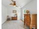 Bedroom featuring a vintage dresser, globe, and ceiling fan at 15508 Normans Landing Dr, Charlotte, NC 28273