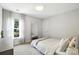 Bright bedroom with neutral walls, plush carpet, and floor-to-ceiling mirror at 15508 Normans Landing Dr, Charlotte, NC 28273