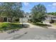 Beautiful home with a two-car garage and a long driveway, framed by mature trees and well-maintained lawn at 15508 Normans Landing Dr, Charlotte, NC 28273