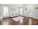 Cozy living room with natural light, hardwood floors, and simple decor creating a warm, inviting atmosphere at 15508 Normans Landing Dr, Charlotte, NC 28273