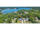 Aerial view of the house near a lake and lush greenery at 15818 Sparrowridge Ct, Charlotte, NC 28278