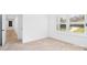 Bright bedroom with plush carpeting and natural light from shuttered windows at 15818 Sparrowridge Ct, Charlotte, NC 28278