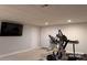 Finished basement area featuring neutral carpet, recessed lighting, and a large wall-mounted television at 1764 Pipers Ridge Nw Cir, Conover, NC 28613