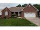 Charming single-story brick home featuring an attached two-car garage and well-maintained landscaping at 1764 Pipers Ridge Nw Cir, Conover, NC 28613