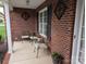 Inviting front porch with comfortable seating, perfect for relaxing and enjoying the outdoors at 1764 Pipers Ridge Nw Cir, Conover, NC 28613