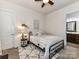 This bedroom offers a ceiling fan, neutral decor, and a decorative rug at 2005 Arbor Hills Dr, Indian Trail, NC 28079
