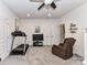 Finished bonus room offering a comfortable seating area and exercise space with a treadmill at 2005 Arbor Hills Dr, Indian Trail, NC 28079