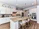 Spacious kitchen features granite countertops, stainless steel appliances, and a breakfast bar at 2005 Arbor Hills Dr, Indian Trail, NC 28079