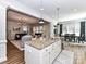 Open kitchen with a large island, stainless steel appliances, and views of the living spaces at 2005 Arbor Hills Dr, Indian Trail, NC 28079