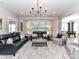 Spacious living room with neutral colors, plenty of seating, and an open layout, perfect for entertaining at 2005 Arbor Hills Dr, Indian Trail, NC 28079