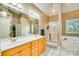 Bathroom featuring double vanity, shower and soaking tub at 225 Northchase Dr, Concord, NC 28027