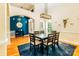 Formal dining room with hardwood floors, modern light fixture and backyard views at 225 Northchase Dr, Concord, NC 28027