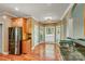 Bright eat-in kitchen features stainless steel appliances, granite countertops, and hardwood floors at 225 Northchase Dr, Concord, NC 28027