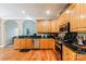 Spacious kitchen with wooden cabinets, granite countertops and stainless steel appliances at 225 Northchase Dr, Concord, NC 28027