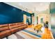 Spacious living room with hardwood floors, comfortable seating, and an open layout at 225 Northchase Dr, Concord, NC 28027