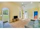 Bright living room featuring vaulted ceiling and a large window overlooking the front yard at 225 Northchase Dr, Concord, NC 28027