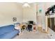 Office featuring a spacious desk, futon, and natural light at 225 Northchase Dr, Concord, NC 28027