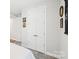 Bright bedroom featuring double doors, light gray carpet, and neutral wall colors at 3022 Trace Meadow Ct, York, SC 29745