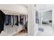 Walk-in closet with a view of the bathroom, bedroom, and tiled walk-in shower at 3022 Trace Meadow Ct, York, SC 29745