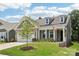 Attractive home with a charming porch, manicured lawn, and a combination of siding and brick at 3022 Trace Meadow Ct, York, SC 29745