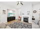 Cozy living room featuring a fireplace, modern decor, and a comfortable seating arrangement at 3022 Trace Meadow Ct, York, SC 29745