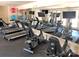 Well-equipped workout room with treadmills, stationary bikes, and mirrored wall for training at 3022 Trace Meadow Ct, York, SC 29745
