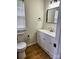 Modern bathroom includes a vanity, toilet, and updated fixtures at 3106 Faircroft Way, Monroe, NC 28110