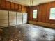 Spacious garage featuring a functional garage door and windows, providing natural light for projects or storage at 3106 Faircroft Way, Monroe, NC 28110