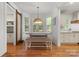 Bright dining area featuring built in bench seating with adjacent kitchen at 319 Catawba Ave, Rock Hill, SC 29730