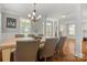 Spacious dining room with hardwood floors and large windows at 319 Catawba Ave, Rock Hill, SC 29730