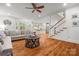 Open concept living room with hardwood floors, a ceiling fan, and a view of the kitchen at 319 Catawba Ave, Rock Hill, SC 29730