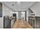 Basement kitchen featuring black appliances, countertop space, and potential for in-law suite at 408 Camelot Dr, Salisbury, NC 28144