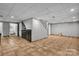 Spacious basement features tile floors, kitchenette, and ample room for recreation or storage at 408 Camelot Dr, Salisbury, NC 28144