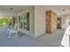 Inviting covered front porch with rocking chairs and windows offering serene views at 408 Camelot Dr, Salisbury, NC 28144
