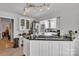 Modern kitchen features white cabinets, granite countertops, and stainless steel appliances at 408 Camelot Dr, Salisbury, NC 28144